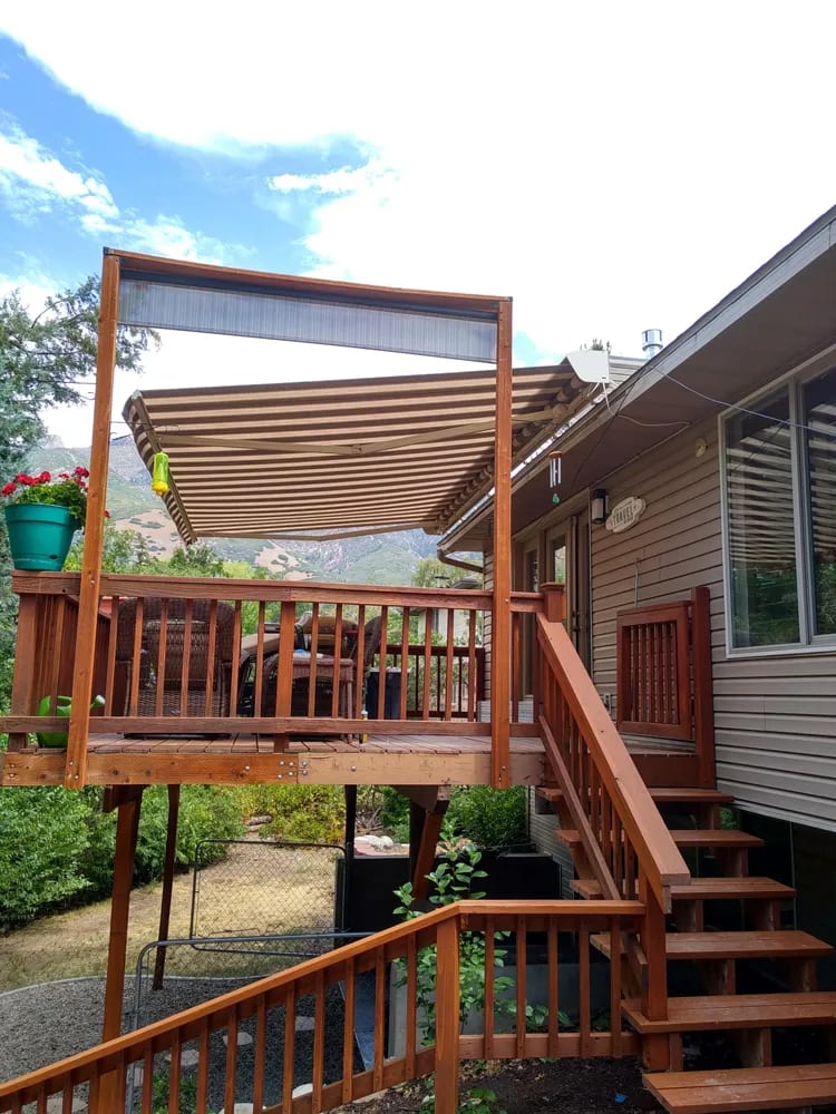 Retractable awning on backyard patio