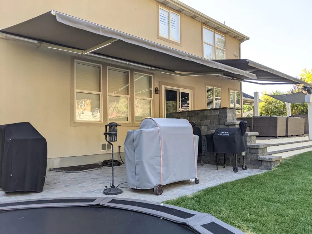 Striped awning over outdoor seating