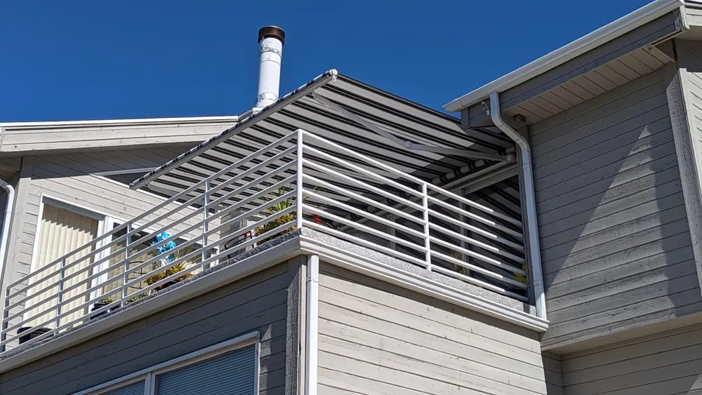Retractable awning over patio seating