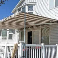 Retractable awning over outdoor seating