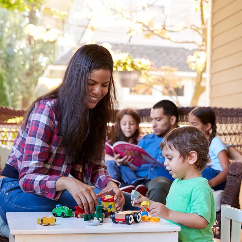 Family gathered on a covered porch