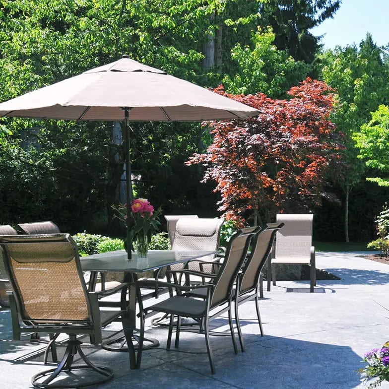 Outdoor patio seating area prepared for a shade consultation
