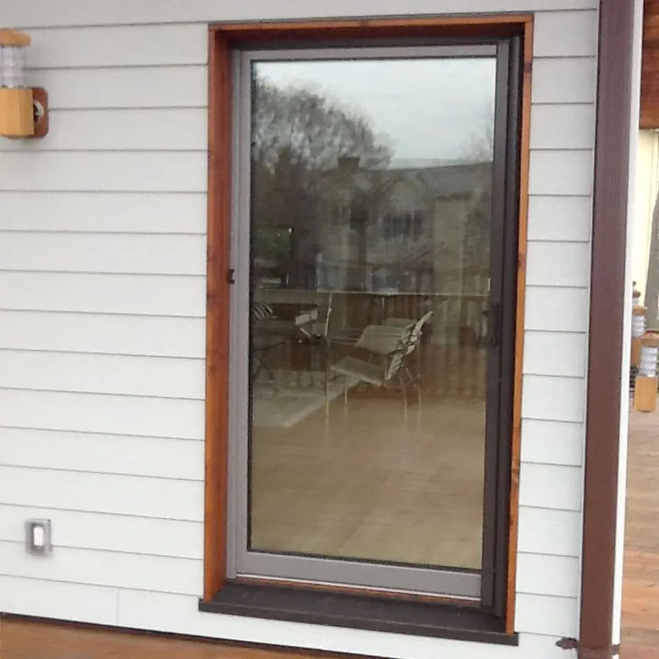 Single door retractable screen installed on an entry door