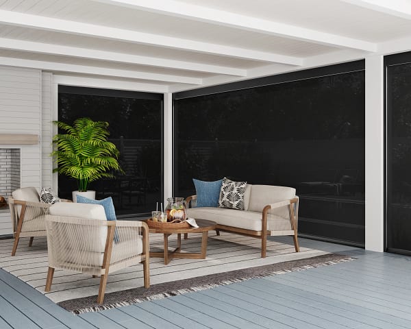 SunSetter EasyScreen with black frames enclosing a covered patio